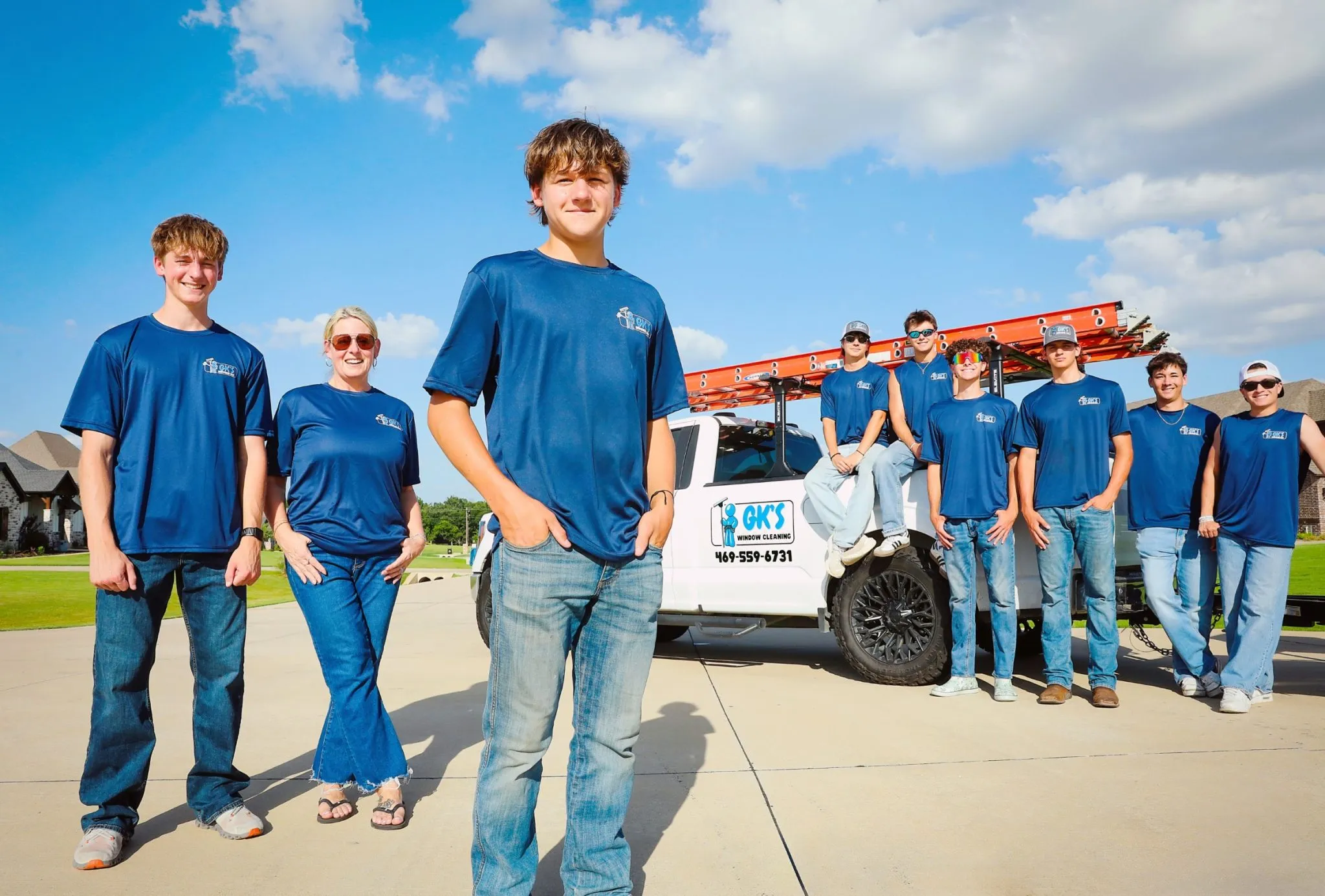 The GK's Services crew with the company truck on a North Texas afternoon