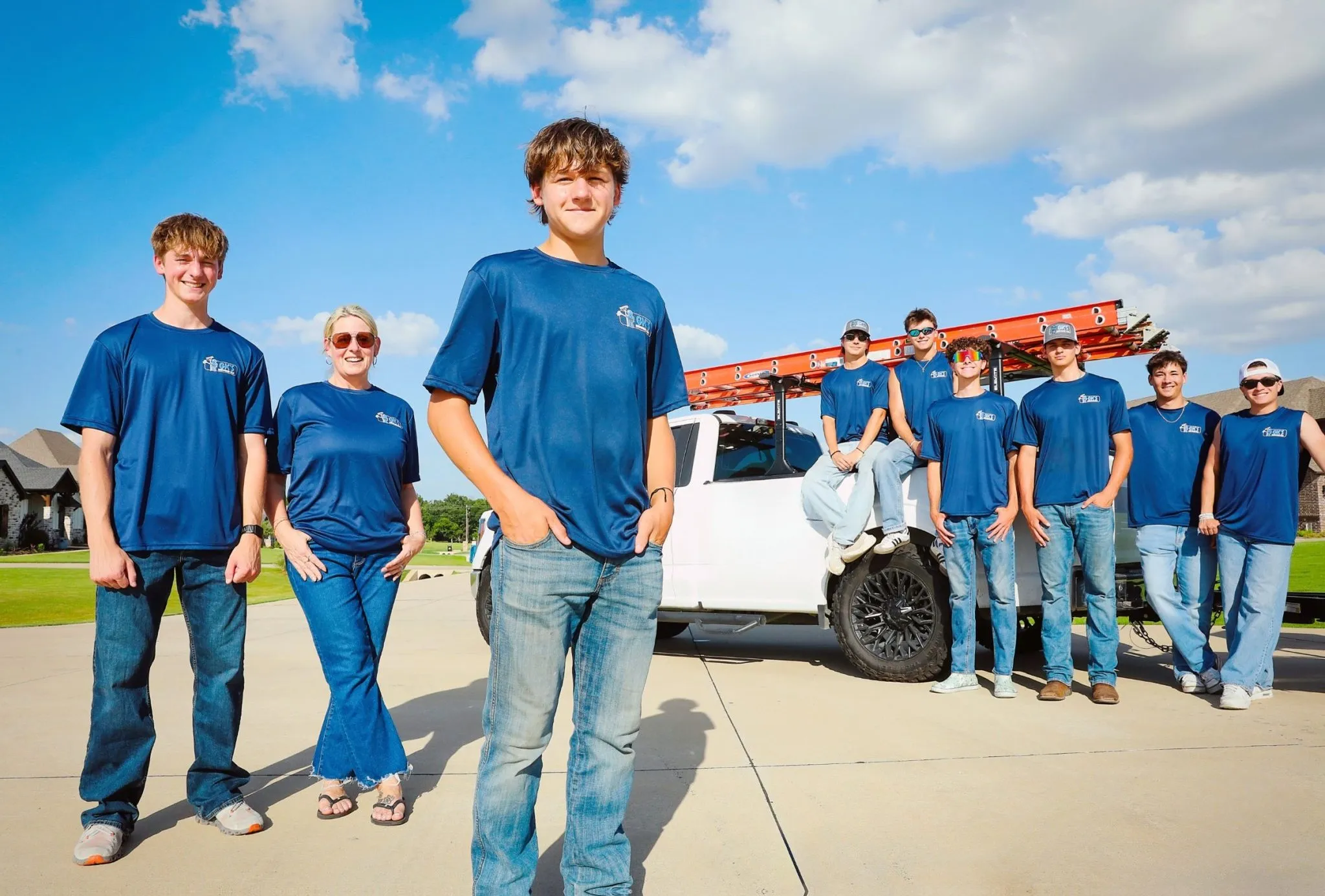 The GK's Services crew with the company truck on a North Texas afternoon